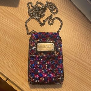 Reversible sequin wallet and phone holder Nine West